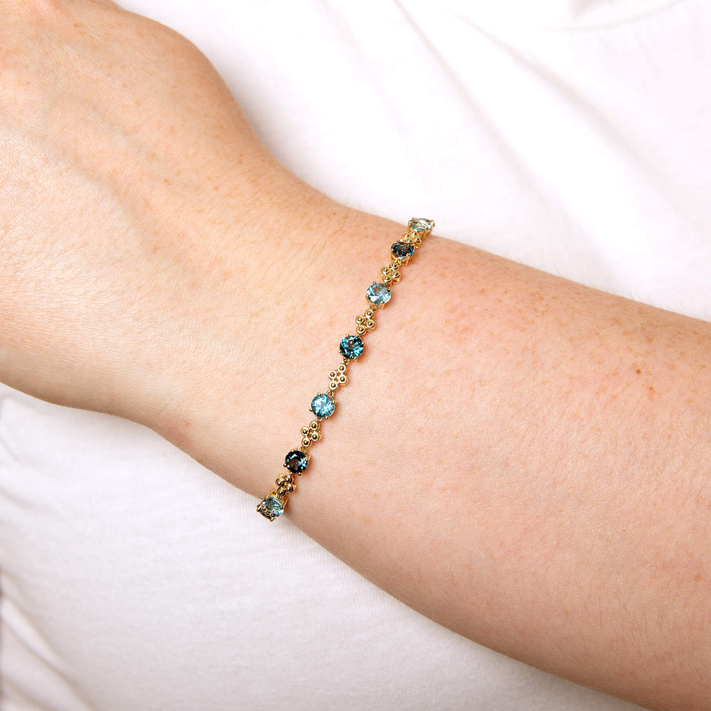 Elements Gold Ornate Blue Topaz Bracelet