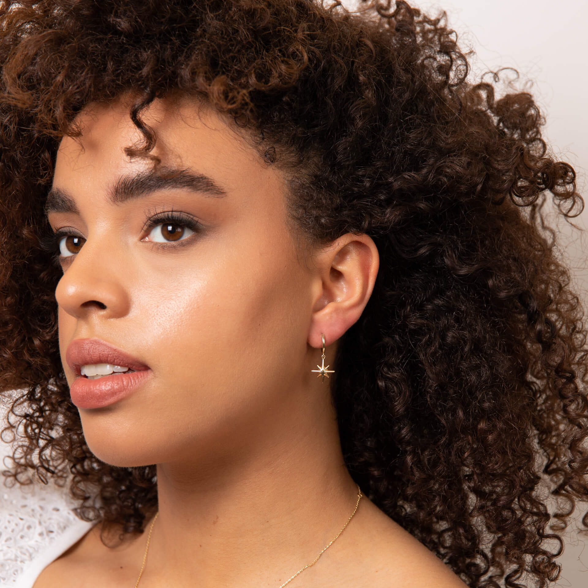 Elements Gold Starburst Charm Hoop Earrings