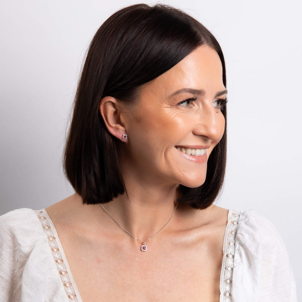 Elements Gold Cushion Cut Ruby with Diamond Halo Stud Earrings