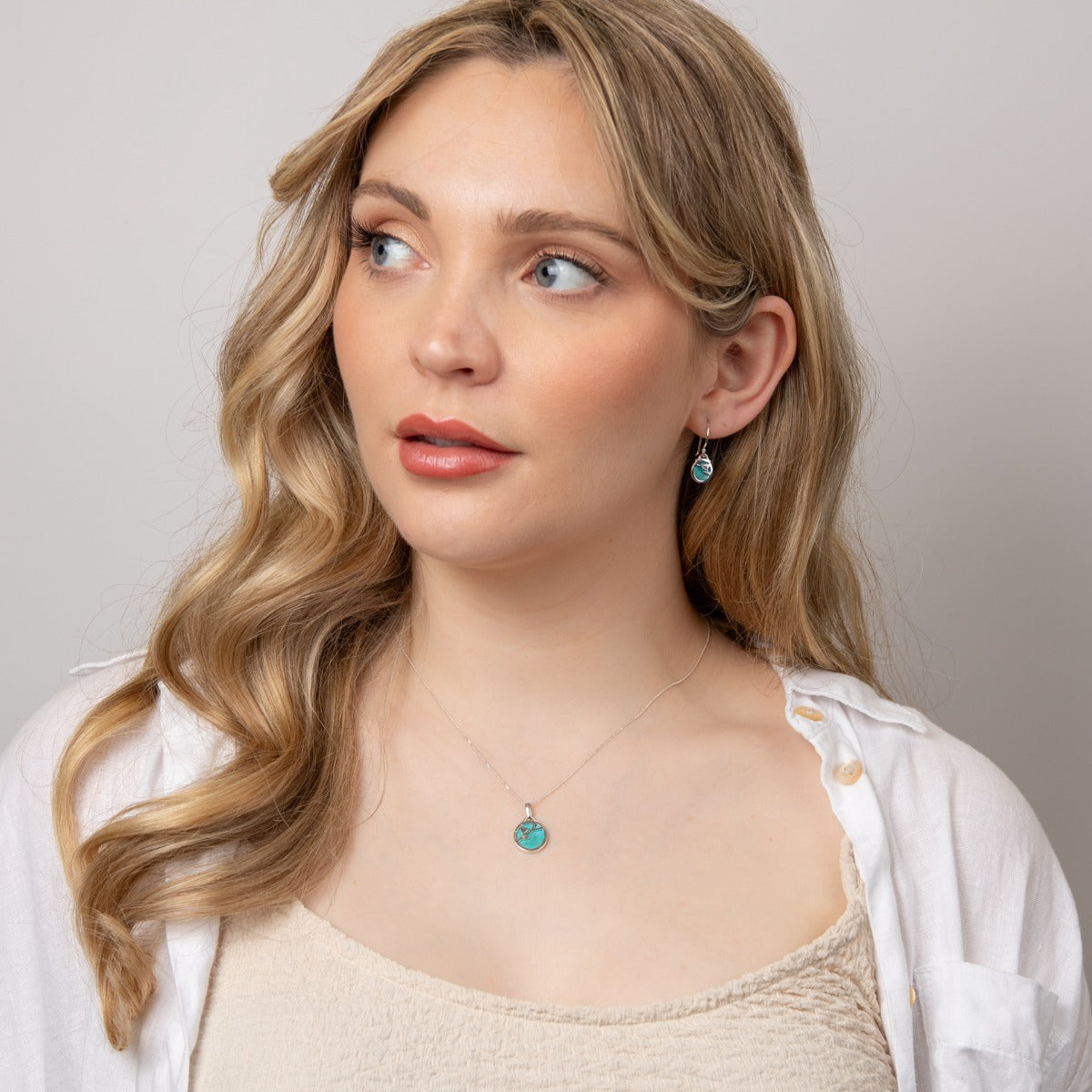 Beginnings Flower Pattern Pendant with Turquoise Background